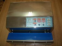 Masina de ambalat in vid