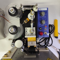 Masina pentru tiparirea datelor pe materiale plate