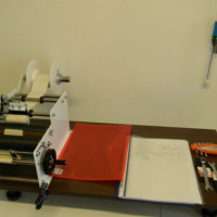 Sistem de etichetare/ etichetare recipiente cilindrice