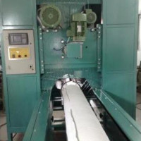 Masina de debitat role lungi de hartie  pt.  productie  hartie de  toaleta  si  prosoape de  bucatarie